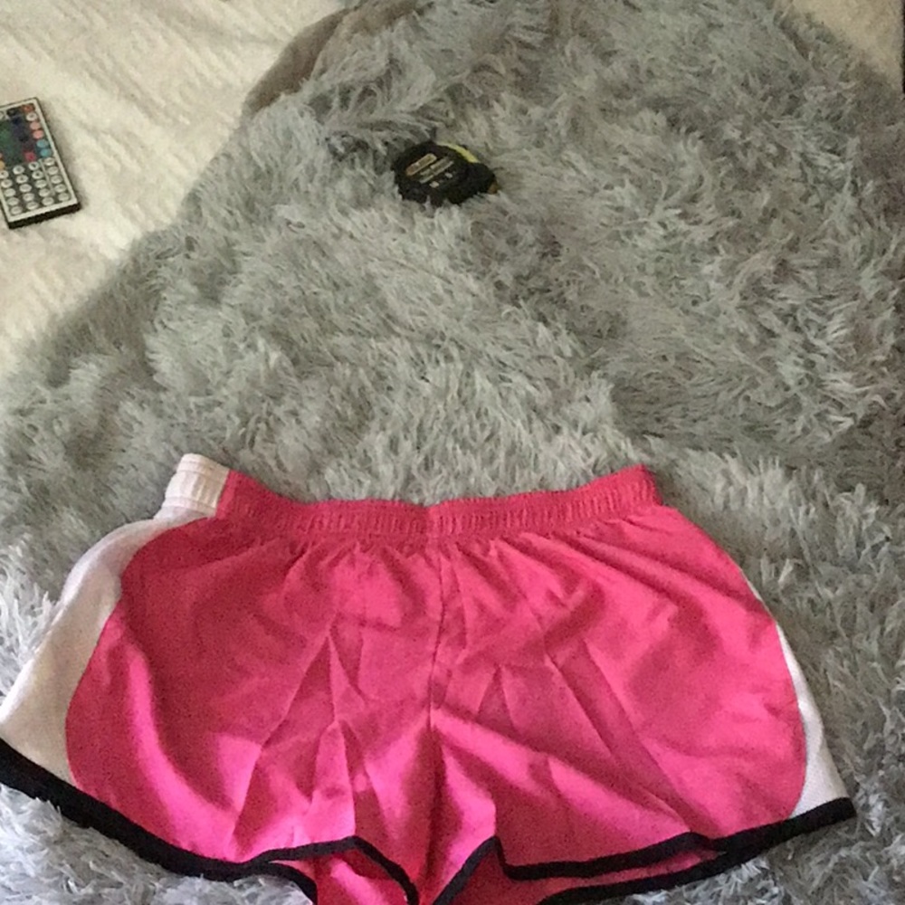 Danskin now athletic pink with white strip shorts